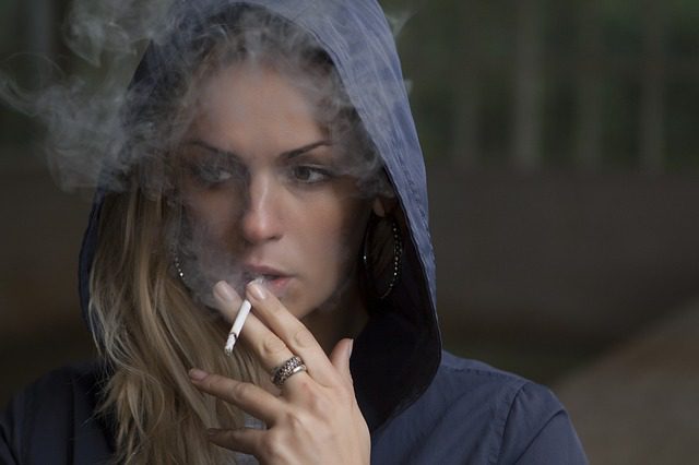 smoking a cigarette with nicotine